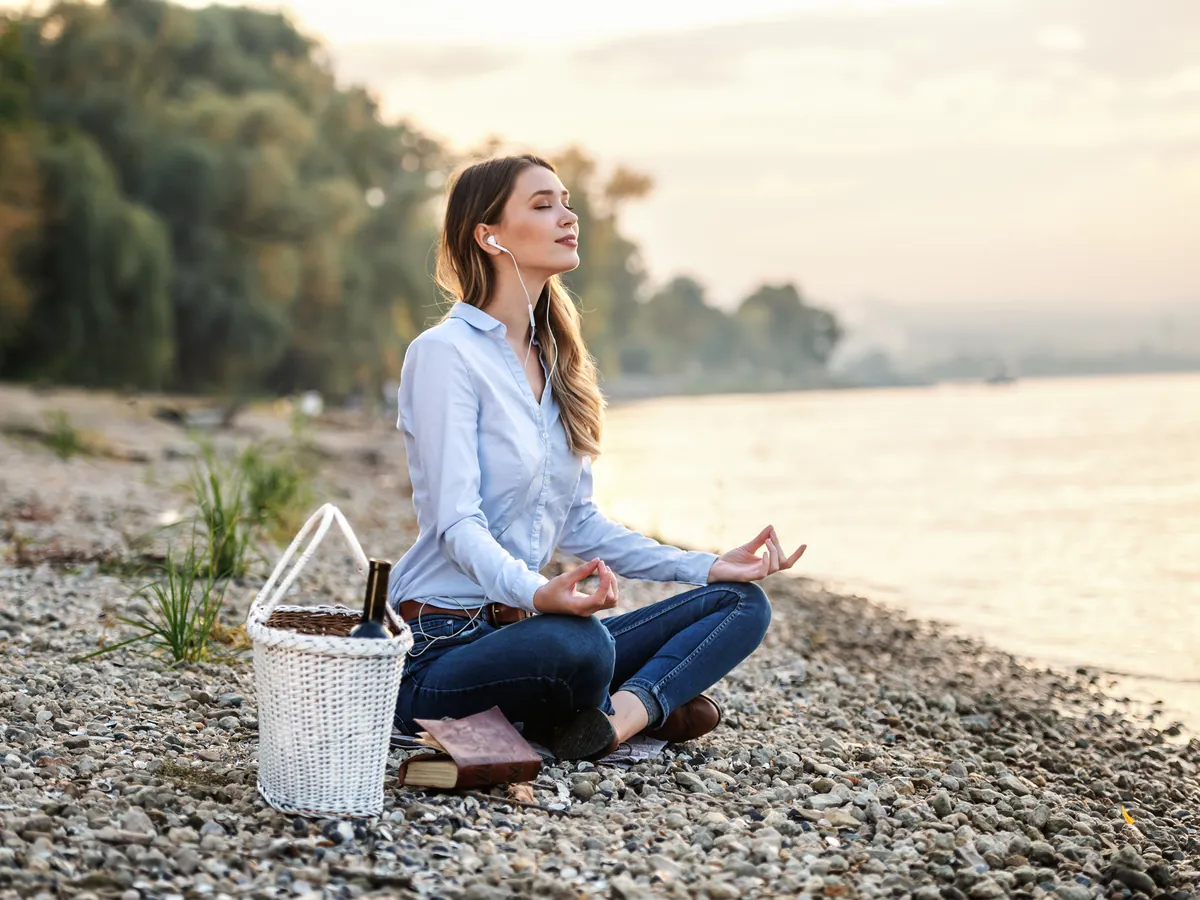 Stress management meditation by the river at Divine Holistic Health Retreat Haridwar